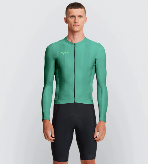 A man wearing veridian color training ls jersey