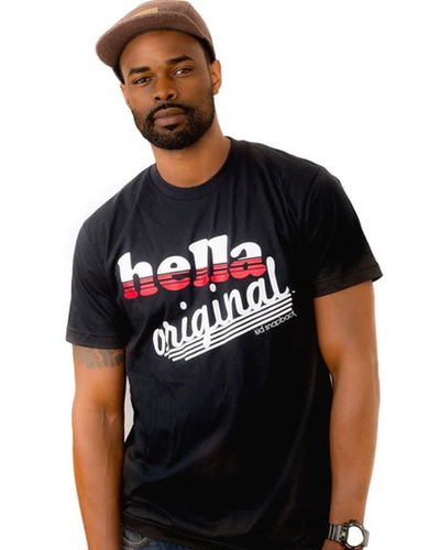 A man wearing black graphic t-shirt
