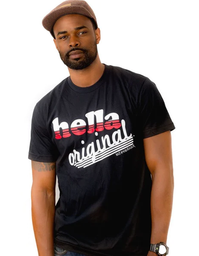 A man wearing black graphic t-shirt