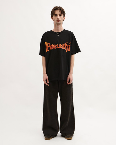 A man wearing black blacksmith t-shirt
