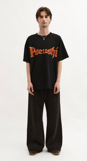 A man wearing black blacksmith t-shirt