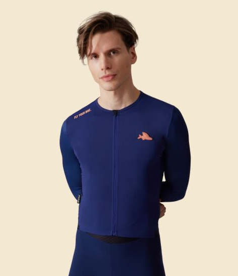 A man wearing navy superlight cycling jersey
