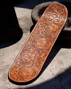 A wood carved skateboard by NÁMENK