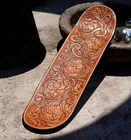 A wood carved skateboard by NÁMENK