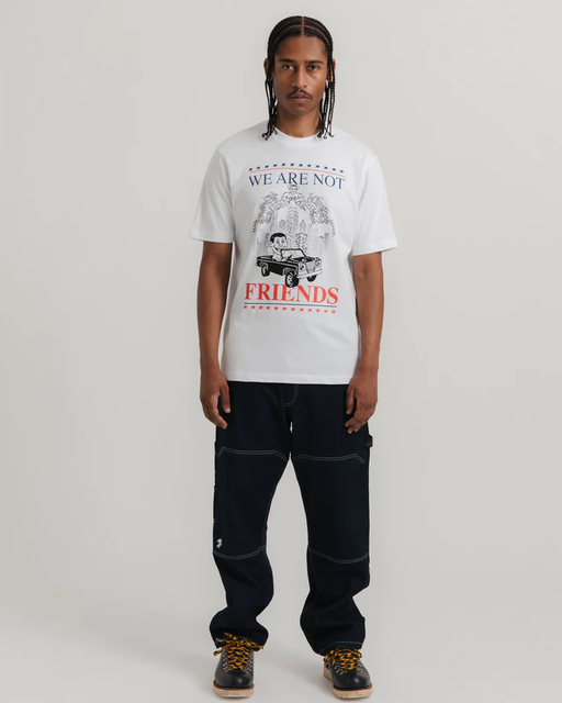 A man wearing white carcetti 4 president tee