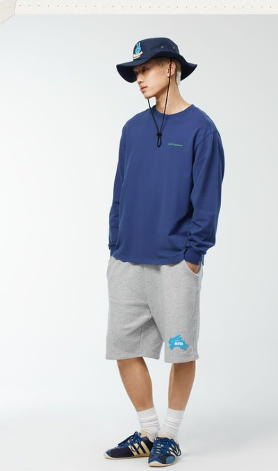 A man wearing blue sweatshirt