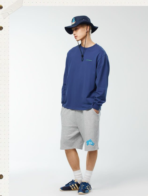 A man wearing blue sweatshirt