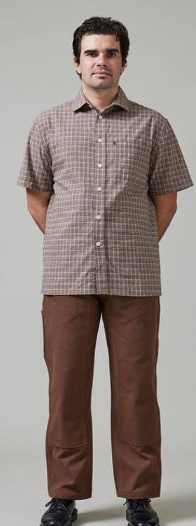 A man wearing check shirt