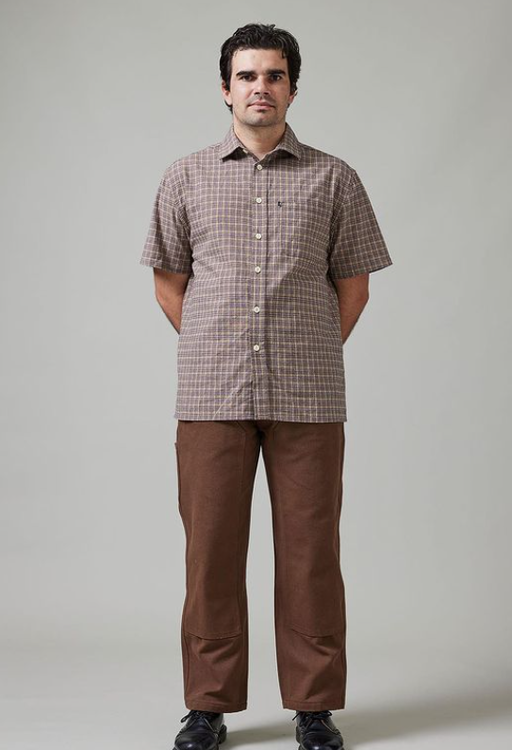A man wearing check shirt