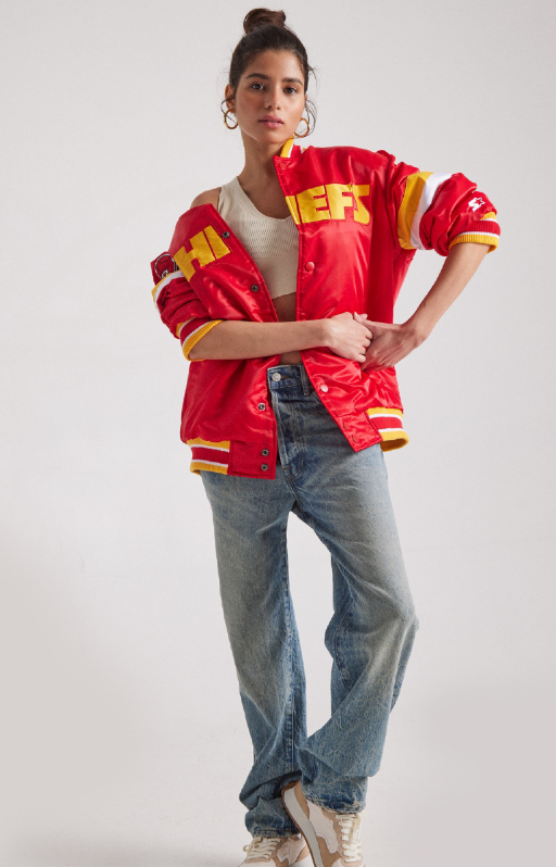 A woman wearing a red super bowl showdown jacket