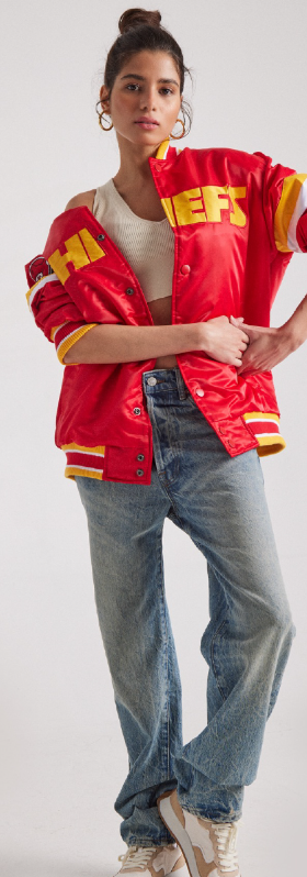 A woman wearing a red super bowl showdown jacket