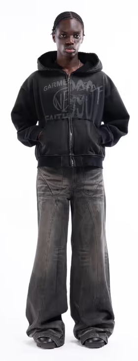 A man wearing split zip jacket used black