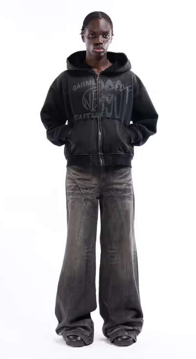 A man wearing split zip jacket used black