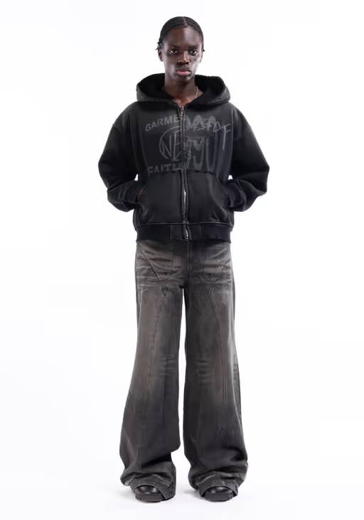 A man wearing split zip jacket used black
