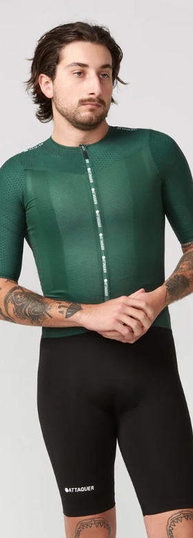 A man wearing ultra+ aero jersey deep green