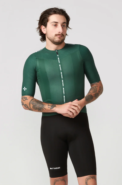 A man wearing ultra+ aero jersey deep green
