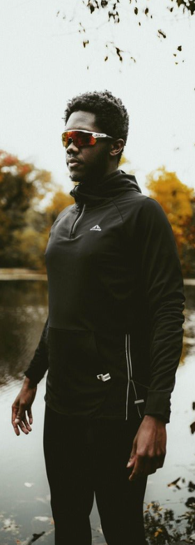 A man wearing black sydney performance hoodie