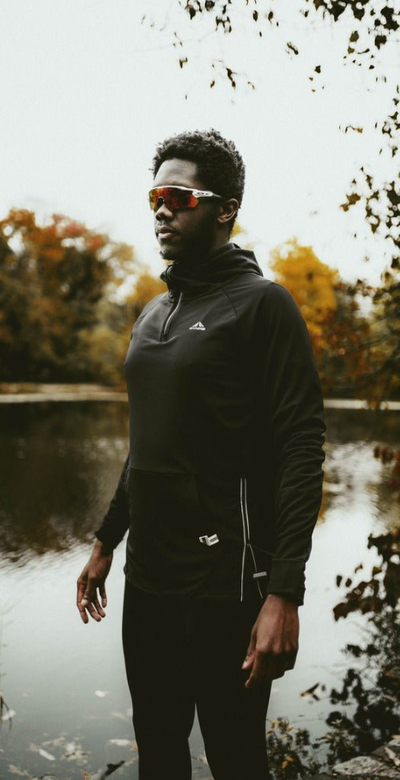 A man wearing black sydney performance hoodie