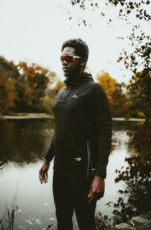 A man wearing black sydney performance hoodie