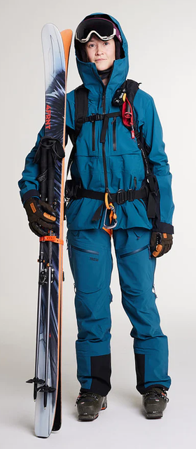 A woman wearing blue pond capow jacket
