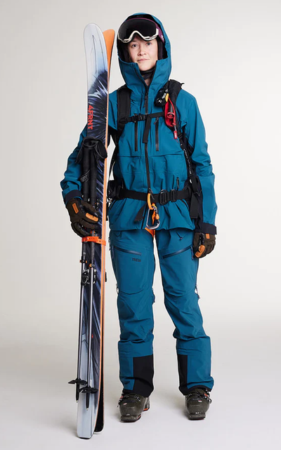 A woman wearing blue pond capow jacket