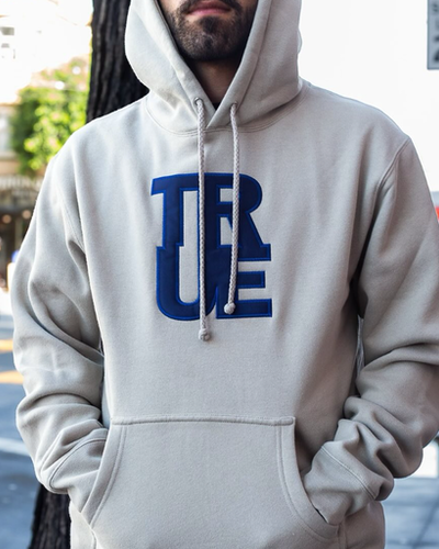 A man wearing white hoodie
