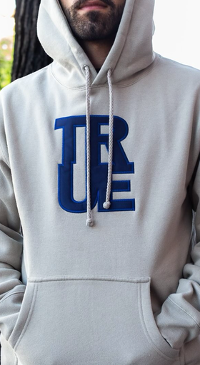 A man wearing white hoodie