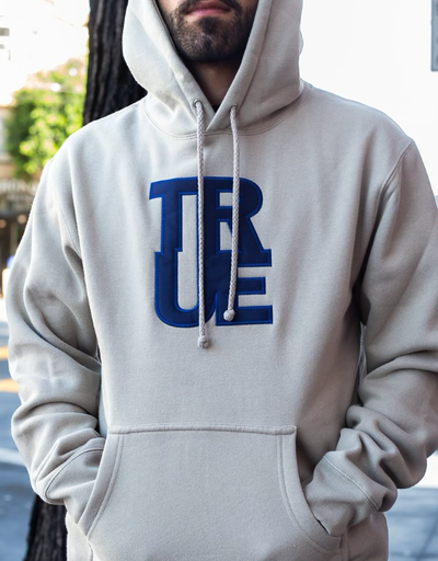 A man wearing white hoodie