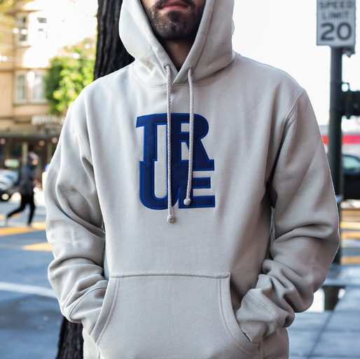 A man wearing white hoodie