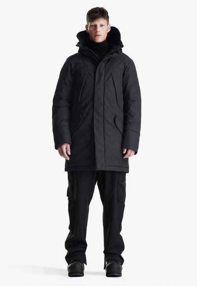 A man wearing black color winter waterproof marcasite parka