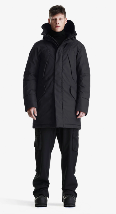 A man wearing black color winter waterproof marcasite parka