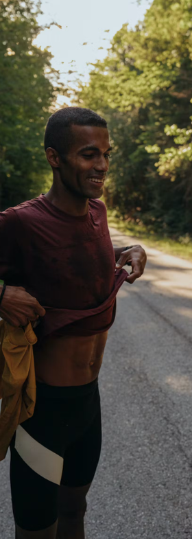 A man wearing berry color harrier t-shirt