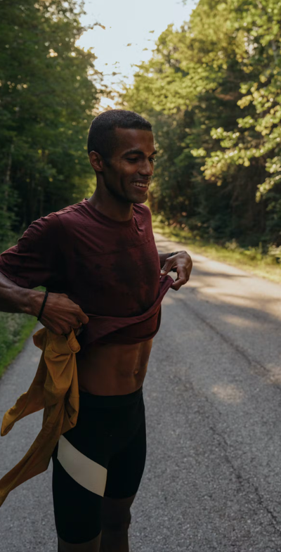 A man wearing berry color harrier t-shirt