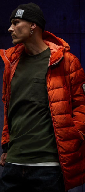 A man wearing orange jacket