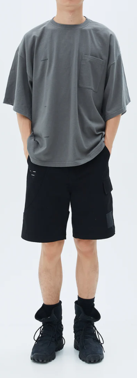 A man wearing roaringwild ss2021 t shape t-shirt