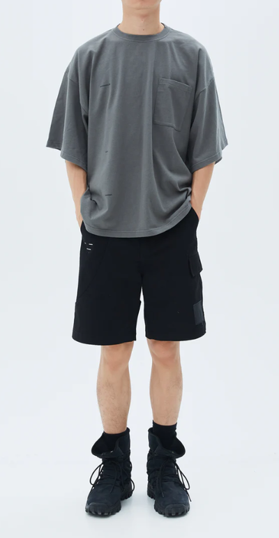 A man wearing roaringwild ss2021 t shape t-shirt