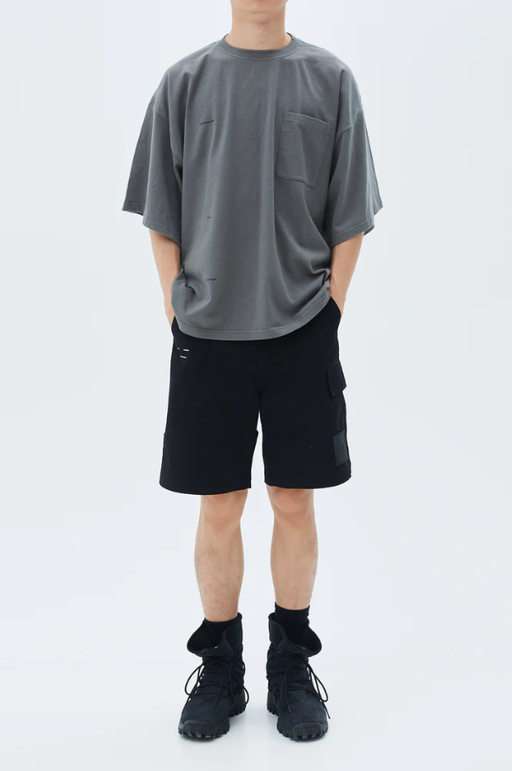 A man wearing roaringwild ss2021 t shape t-shirt