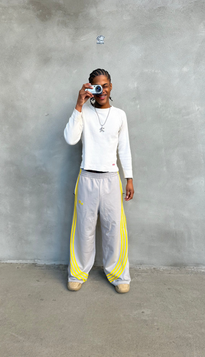 A man wearing slouchy track pant