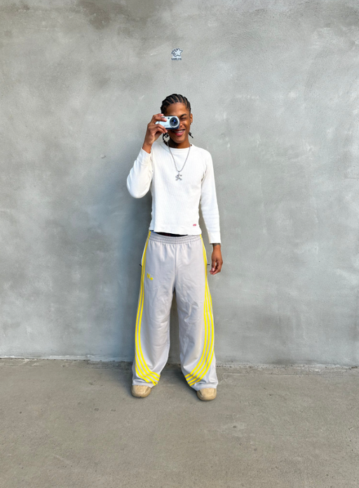 A man wearing slouchy track pant