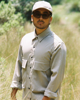 A man wearing hoffman shirt- beige [flexi-shield]