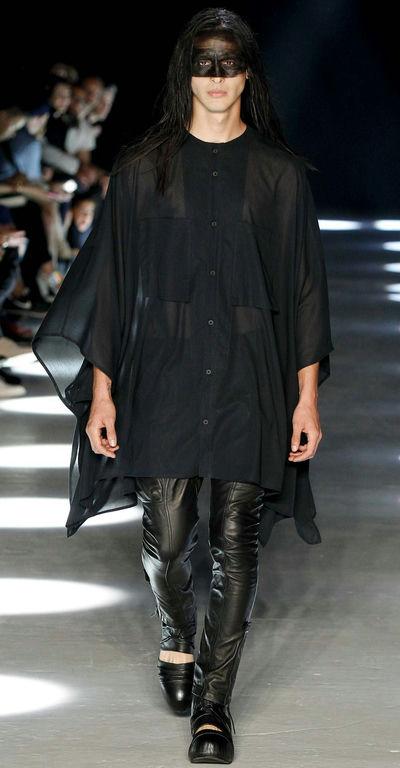A runway model wearing an Alexandre Plokhov all black outfit