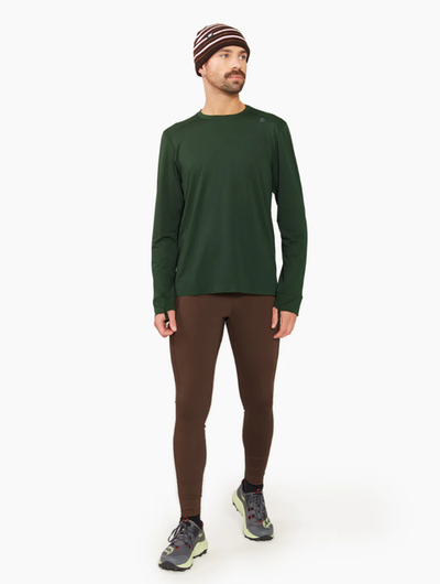 A man wearing green full sleeve t-shirt