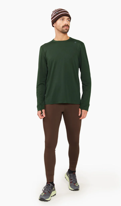 A man wearing green full sleeve t-shirt
