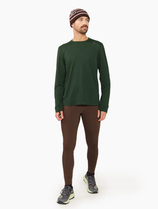 A man wearing green full sleeve t-shirt