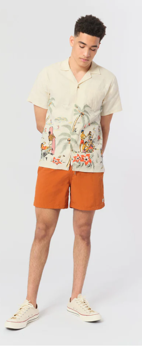 A man wearing a Bather solid ginger swim trunk