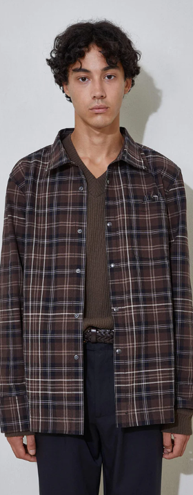 A man wearing L'Homme Rouge's overshirt check
