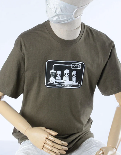 A mannequin wearing olive green abduction t-shirt