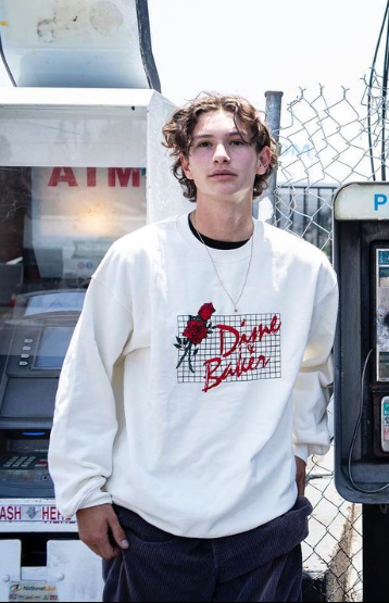 A man wearing white sweatshirt