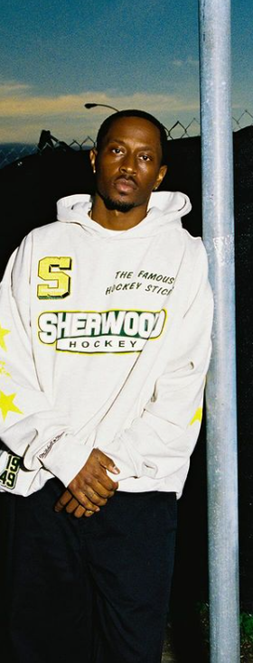 A man wearing white hoodie