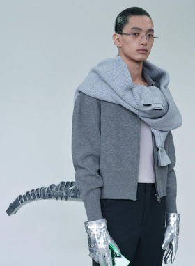 A man wearing ash grey sweatshirt